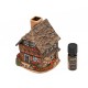 Teelichthaus und Duftlampe Schwarzwaldhaus mit Holzscheiten 1